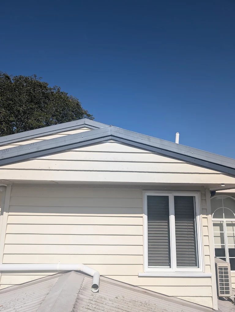 New gable flashing, gutter and downpipe on a weatherboard home