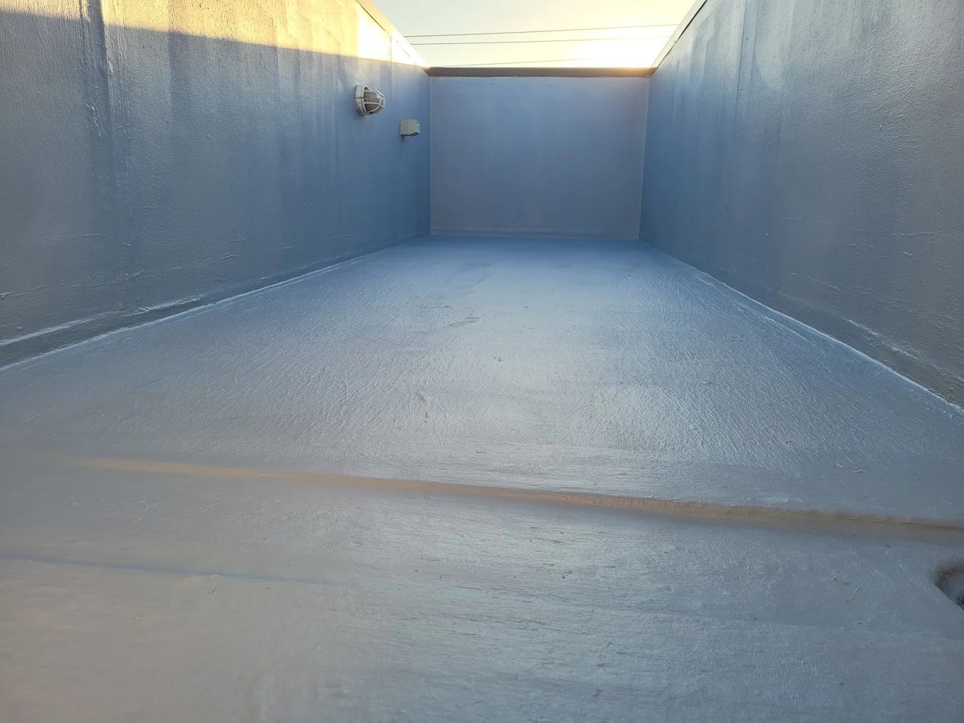 Waterproof membrane applied to a flat roof area