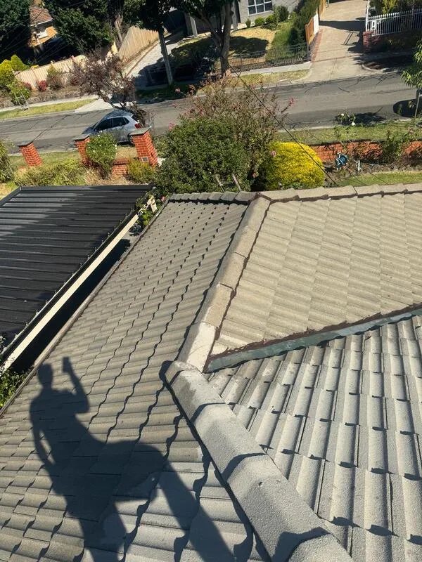 Tile roof sealed and primed ready for colour coats