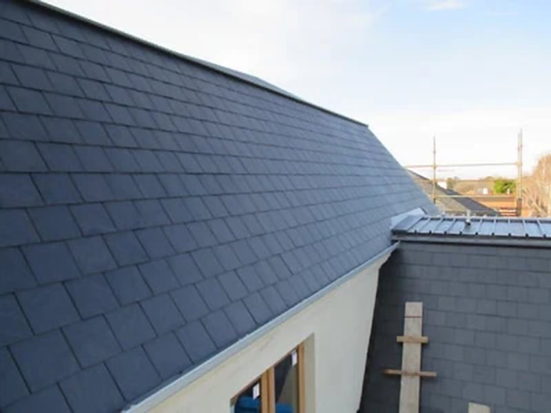 Slate roof with new metal flashing